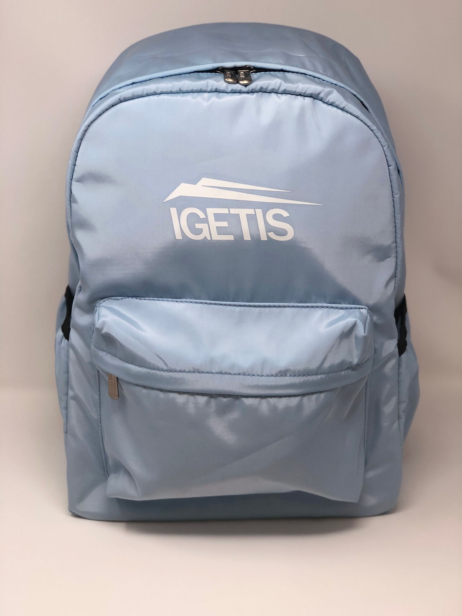 Light blue IGETIS backpack with white logo
